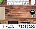 Wood hipster desk with computer gadgets and supplies. Top view with copy space, flat lay. 75966292