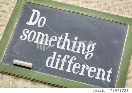 Do something different note on slate blackboard 75971728