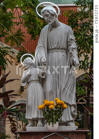 Statue of St. Joseph and the Child Jesus. The Huyen Sy church, Saigon, Vietnam. Statue of St. Joseph and the Child Jesus. The Huyen Sy church, Saigon, Vietnam. 75972735