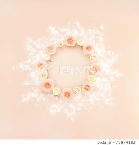 Beautiful pink tea roses wreath on pastel background in retro style. Romantic holiday concept. Flat lay style. Copy space. 75974182