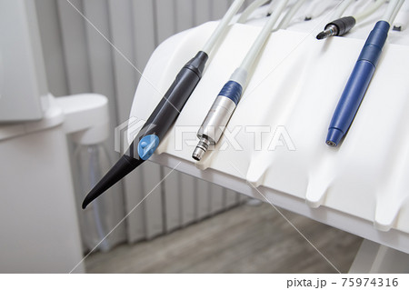 White dental equipment tools for the treatment and filling of teeth 75974316