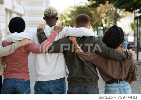 Back view of people making strike on the street, hugging Back view of people making strike on the street, hugging 75974483