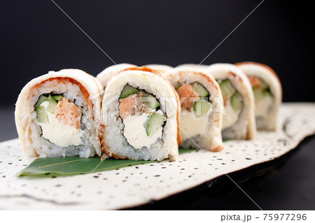 Seafood delicatessen unagi sushi rolls on plate Seafood delicatessen unagi sushi rolls on plate 75977296