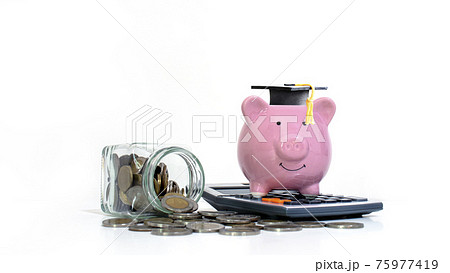 Money flows out of storage bottles and graduate caps placed on piggy banks on white background. Education and finance concept. 75977419