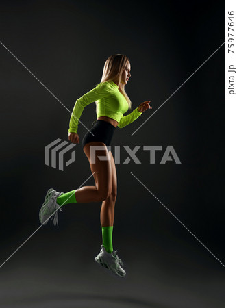 Young sexy sport blonde fitness woman in bright Young sexy sport blonde fitness woman in bright 75977646