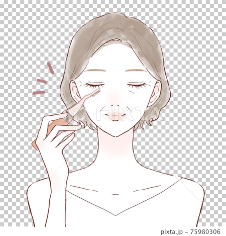 Middle-aged woman curling eyelashes with hot eyelash curler 75980306