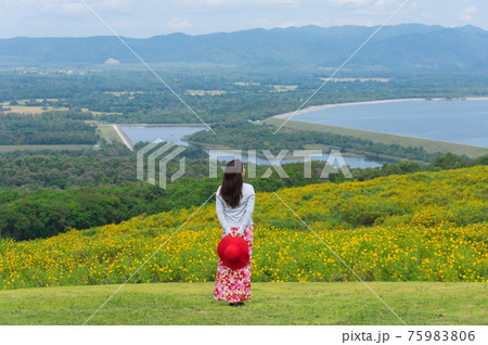 Beautiful woman in nature flower. Beautiful woman in nature flower. 75983806