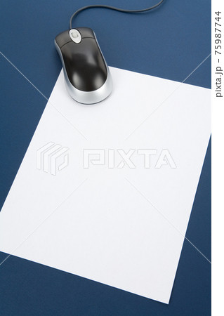 letter paper and computer mouse 75987744