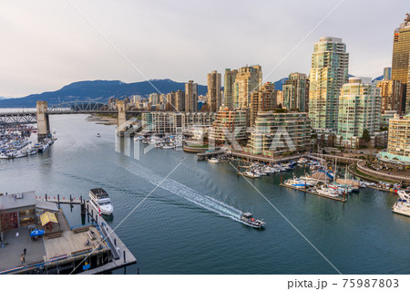Beautiful view of Vancouver downtown skyline at sunset time, False Creek Harbour, British Columbia, Canada. 75987803