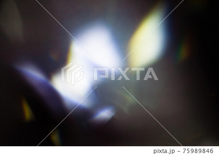 colorful warm rainbow light leaks on black background with dust texture colorful warm rainbow light leaks on black background with dust texture 75989846