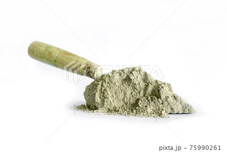 Cement or mortar, including trowel, used for separate construction work on a white background. Cement or mortar, including trowel, used for separate construction work on a white background. 75990261