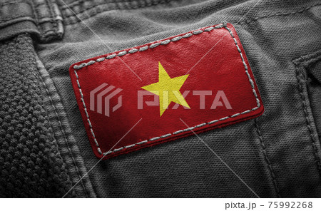 Tag on dark clothing in the form of the flag of the Vietnam 75992268