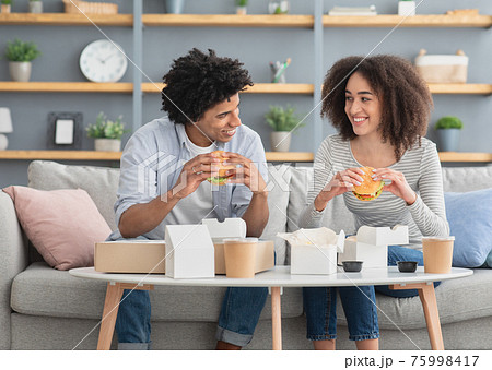 Lunch at home with fast food takeaway restaurant during covid-19 pandemic 75998417