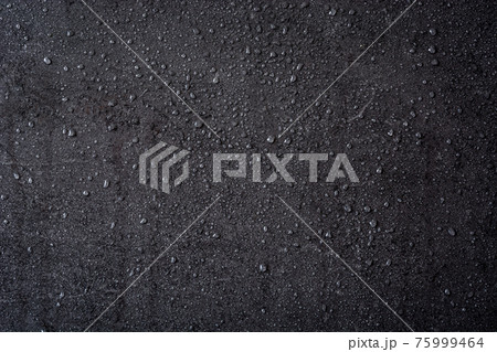 Black background with raindrops 75999464