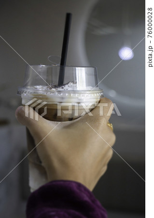 A glass of iced coffee latte with art A glass of iced coffee latte with art 76000028