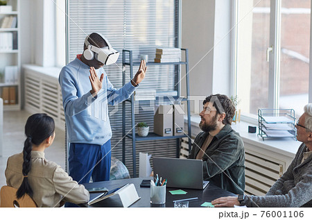 People Testing VR Software in Office 76001106