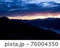 Early morning in the mountains. The sun rises over the mountains. Dawn in the mountains. 76004350