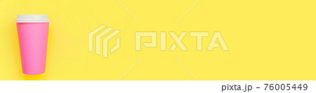 Simply flat lay design pink paper coffee cup isolated on yellow colorful background. Takeaway drink container. Good morning wake up awake concept. Template of drink mockup. Top view copy space, banner Simply flat lay design pink paper coffee cup isolated on yellow colorful background. Takeaway drink container. Good morning wake up awake concept. Template of drink mockup. Top view copy space, banner 76005449