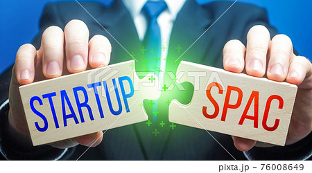 Man connects puzzles with Startup and SPAC. Simplified listing entry to stock exchange. Special purpose acquisition company. Attraction of investments, sale bonds shares for future company merger. 76008649