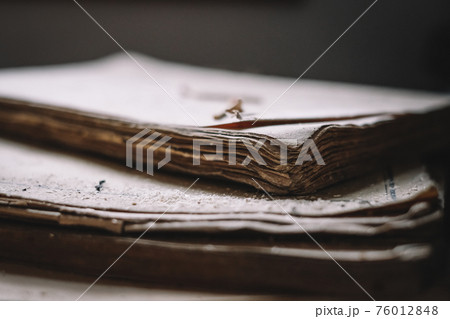 Old books covered with dust. Selective focus Old books covered with dust. Selective focus 76012848