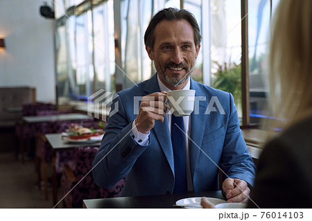 Little coffee date with a charming well-dressed man Little coffee date with a charming well-dressed man 76014103