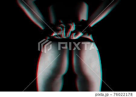 female hands in leather handcuffs for BDSM sex on the background of her sexy ass in a Thong female hands in leather handcuffs for BDSM sex on the background of her sexy ass in a Thong 76022178