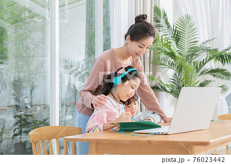 Portrait of happy cheerful family, young mother and two daughters 213 Portrait of happy cheerful family, young mother and two daughters 213 76023442