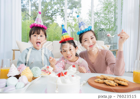 Portrait of happy cheerful family, young mother and two daughters 172 76023515