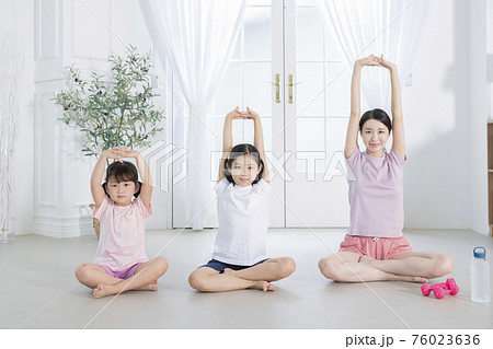 Portrait of happy cheerful family, young mother and two daughters 398 76023636