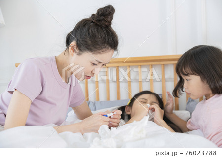 Portrait of happy cheerful family, young mother and two daughters 485 76023788