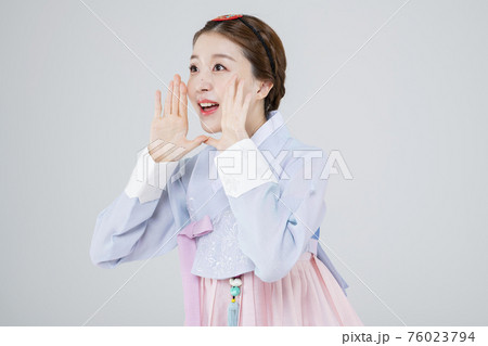 Male and female in Korean traditional clothes Hanbok 018 76023794