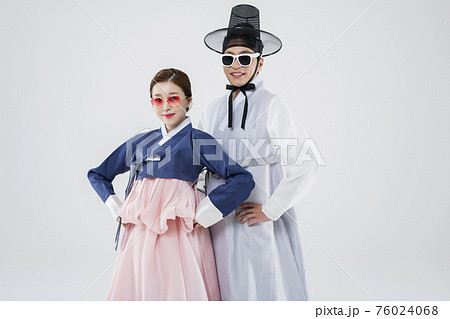Male and female in Korean traditional clothes Hanbok. comic humorous concept. 002 76024068