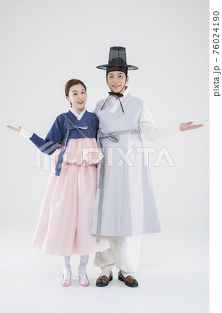 Male and female in Korean traditional clothes Hanbok. comic humorous concept. 101 76024190