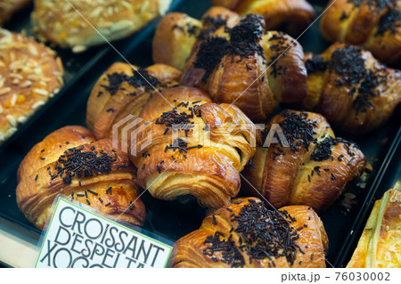 Fresh tasty chocolate croissants on counter, nobody 76030002