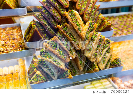 Traditional Turkish baklava from filo pastry for sale Traditional Turkish baklava from filo pastry for sale 76030124