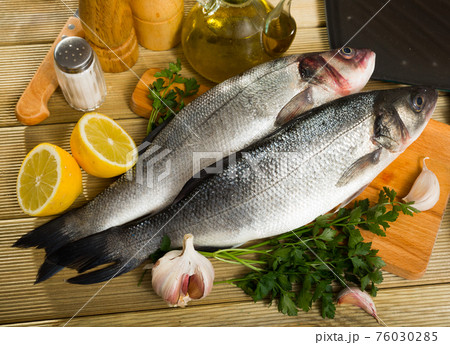 Two raw sea bass fish Two raw sea bass fish 76030285