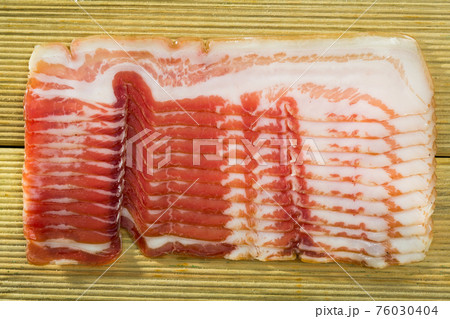 Slices of jamon or traditional spanish panceta curada Slices of jamon or traditional spanish panceta curada 76030404