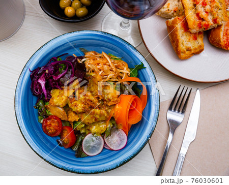 Cesar style salad with antique mustard vinaigrette Cesar style salad with antique mustard vinaigrette 76030601