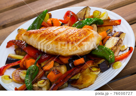 Bulgarian dish plakia, fried chicken fillet tasty baked vegetables Bulgarian dish plakia, fried chicken fillet tasty baked vegetables 76030727