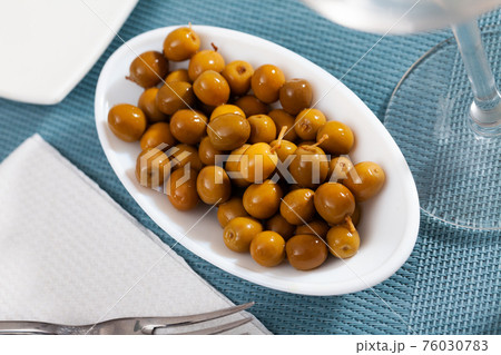 Pitted olives - typical Spanish snack 76030783