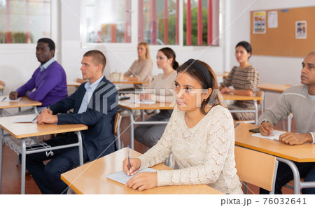 Young woman working during group business training Young woman working during group business training 76032641