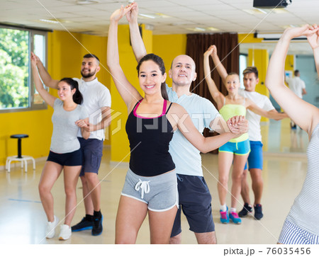 Happy people dancing salsa Happy people dancing salsa 76035456
