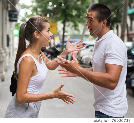 Angry man and woman quarreling 76036732