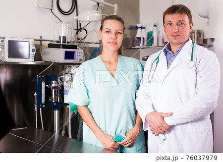 Portrait of a professional doctor veterinarian and nurse in a clinic Portrait of a professional doctor veterinarian and nurse in a clinic 76037979