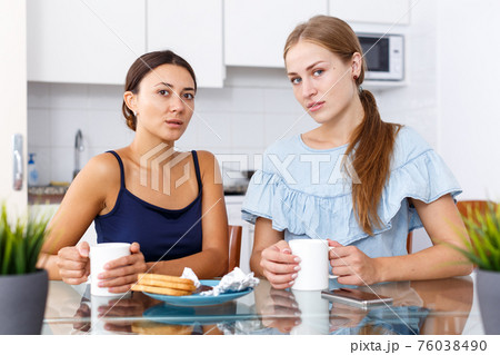 Two smiling girls friends in perfect mood 76038490