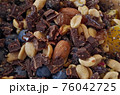 Smoothie bowl with chocolate nuts and fruits 76042725