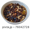 Smoothie bowl with chocolate nuts and fruits 76042728
