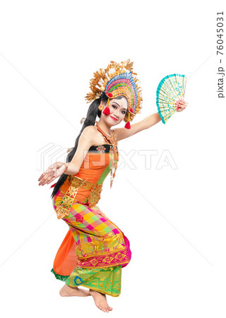 Asian woman dancing Balinese traditional dance 76045031