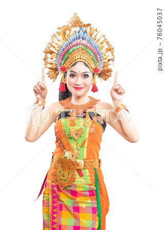 Asian woman dancing Balinese traditional dance 76045037