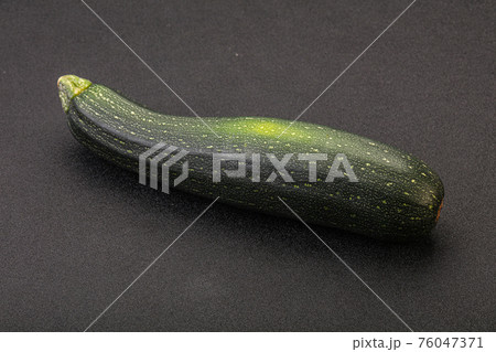 Tasty young organic natural zucchini 76047371